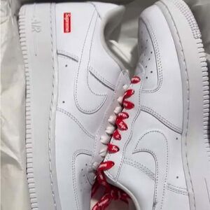 Supreme White Sneakers with Red Details
